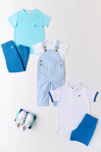 Load image into Gallery viewer, Prim &amp; Proper Polo - Worth Ave White w/ Wood Boat Blue Stork &amp; Cuffs
